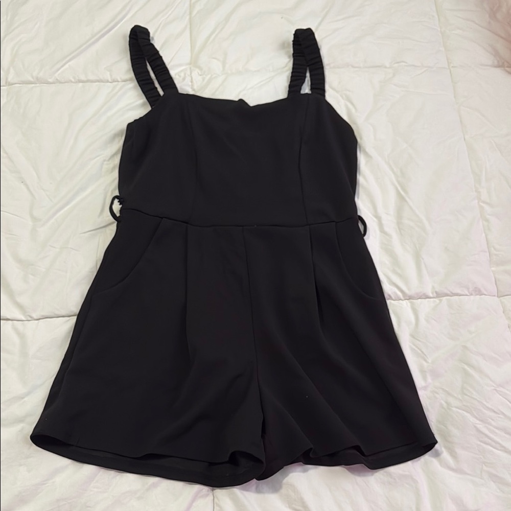 Black jumper size XL fits like a L